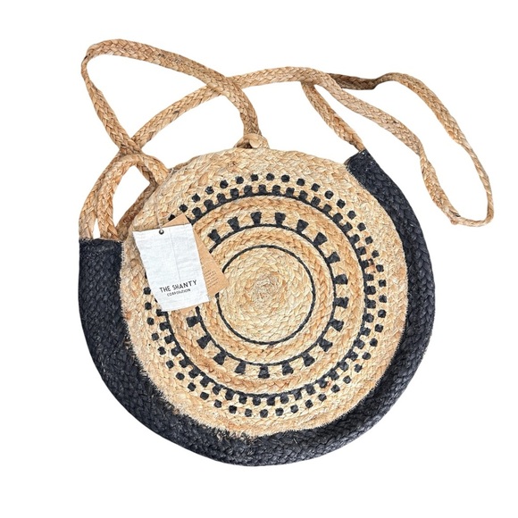 The Shanty Moroccan Round Crossbody Woven Jute Straw Beach Bag in Natural - Picture 1 of 11